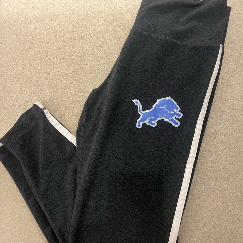 Women's Charcoal Gray Leggings with Detroit Lions logo. Size medium